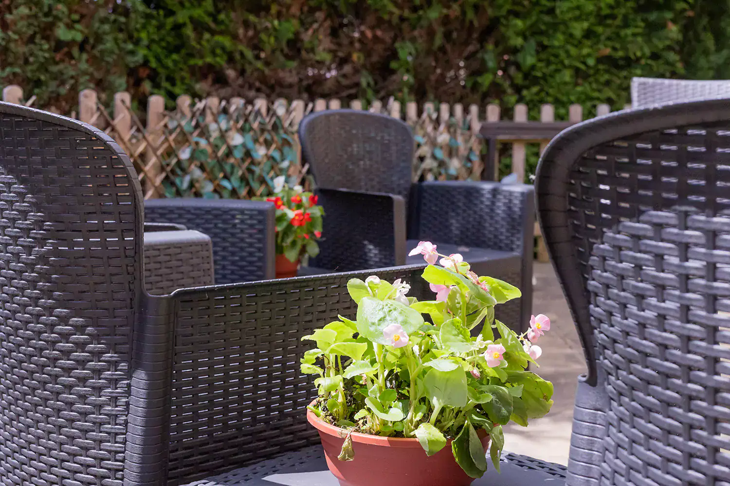 A view of an outdoor seating area in the garden at the care home.